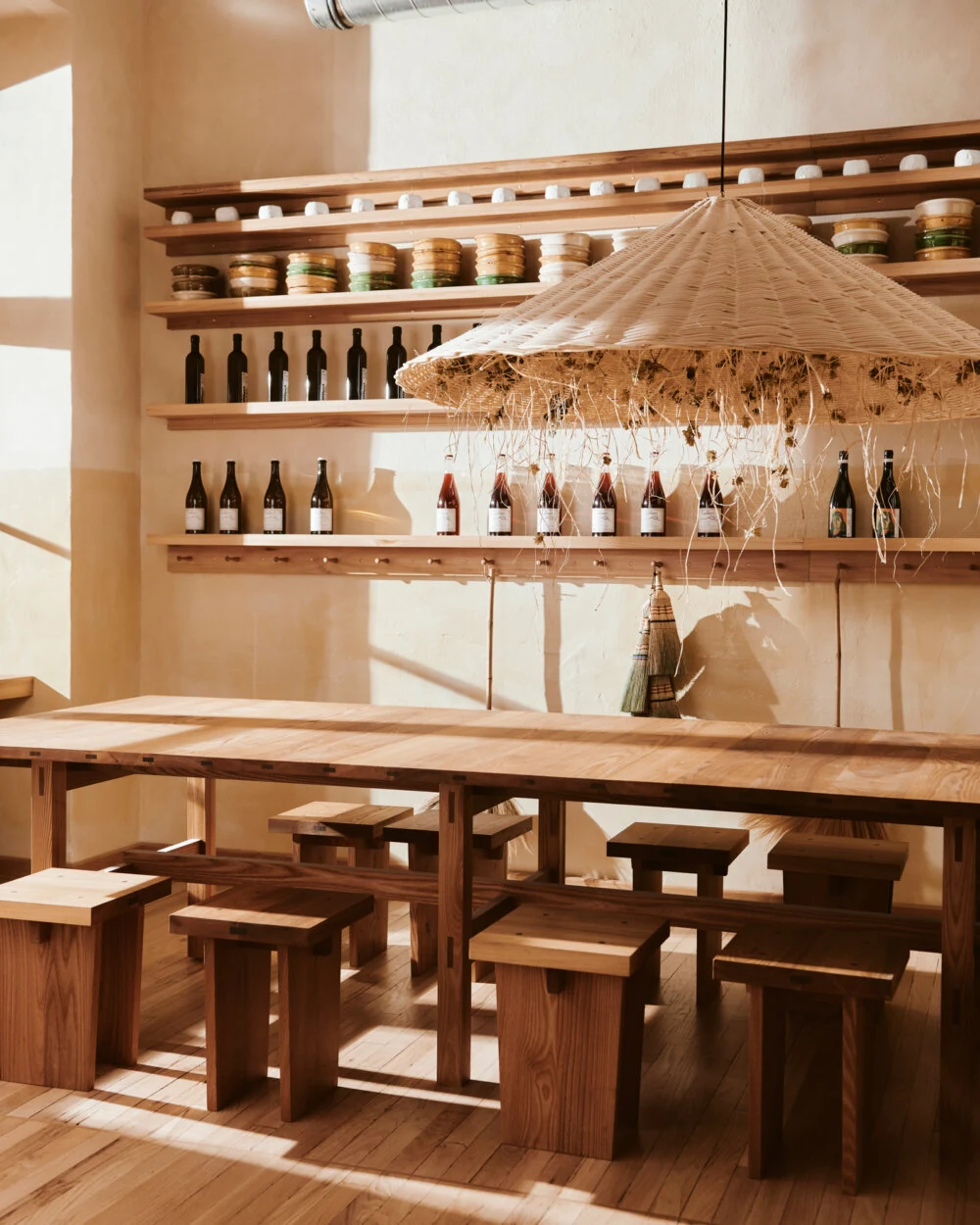 Sofi Bakery — Bakery tables and shelves of preserves