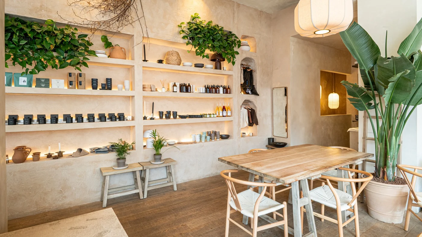 The warm wood tables and ceramic shelves at LOAFT Brighton